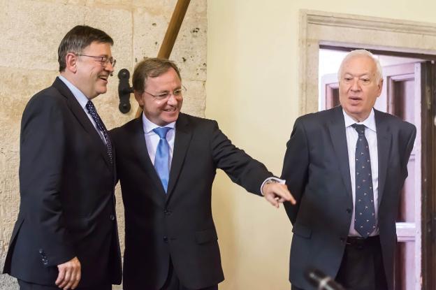 El presidente Ximo Puig y el delegado del Gobierno Juan Carlos Moragues. / JESUS MONTAÑANA