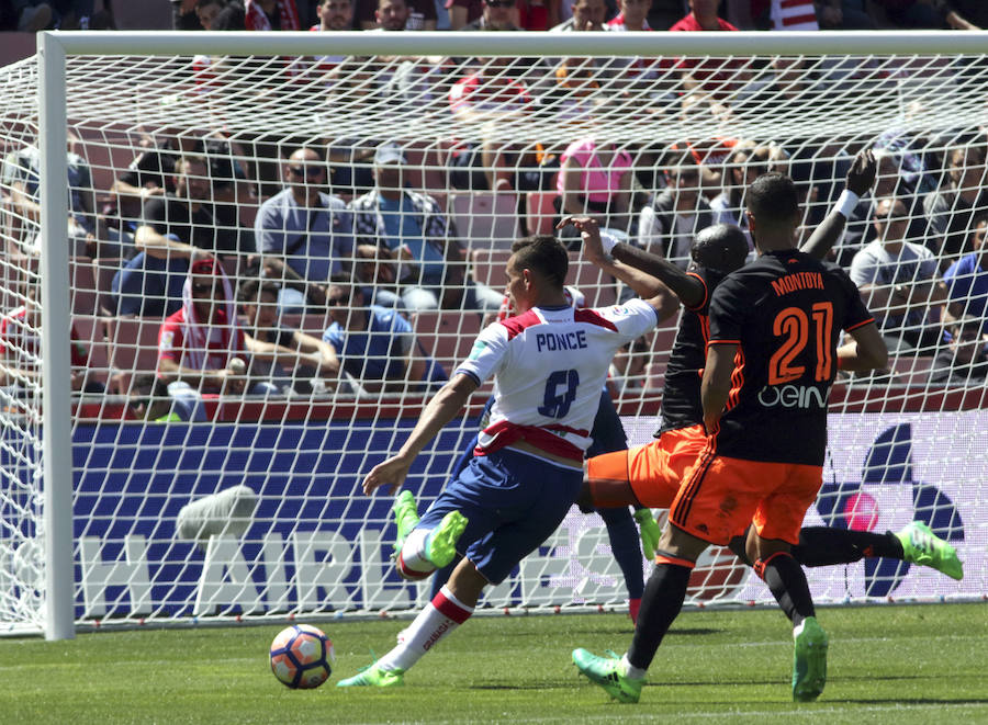 Fotos del partido disputado entre el Granada y el Valencia CF en Los Carmenes