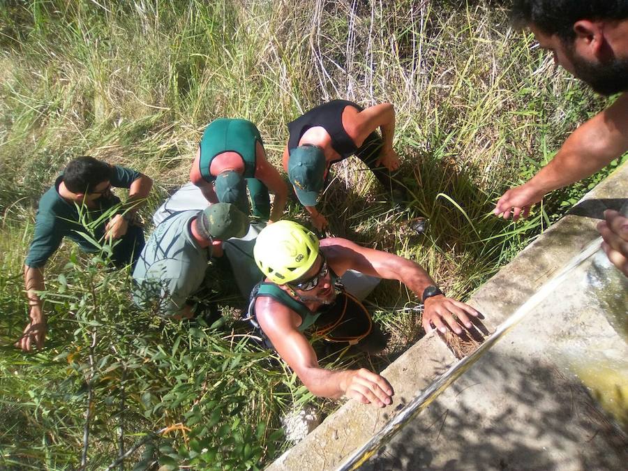 Fotos del rescate del cuerpo del menor en el río Cabriel