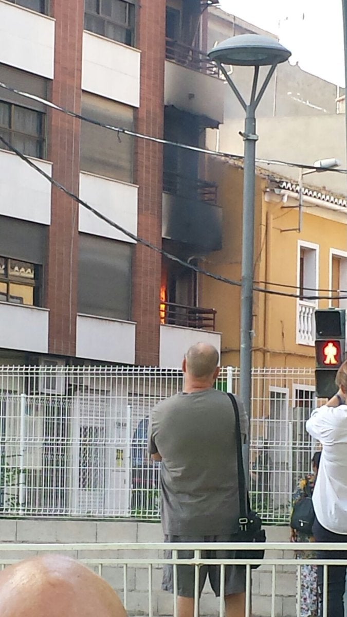 Fotos del incendio en un domicilio de Picassent