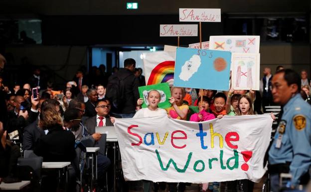 Líderes mundiales intentan en Bonn impulsar el Acuerdo de París contra el rechazo de Trump