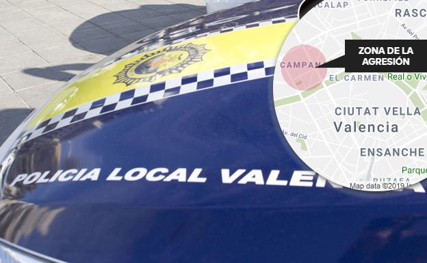 Un hombre agrede a patadas a su pareja en una calle de Valencia y es retenido por varios testigos