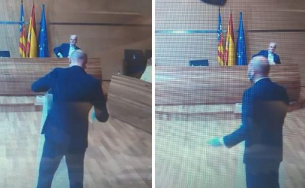 Gaspar desinfecta el atril de los portavoces durante el pleno de la Diputación