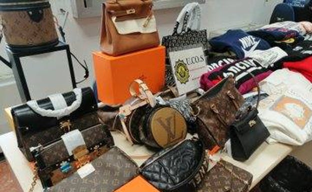 Confiscan artículos falsificados por valor de 5.000 euros en una tienda ilegal de Valencia