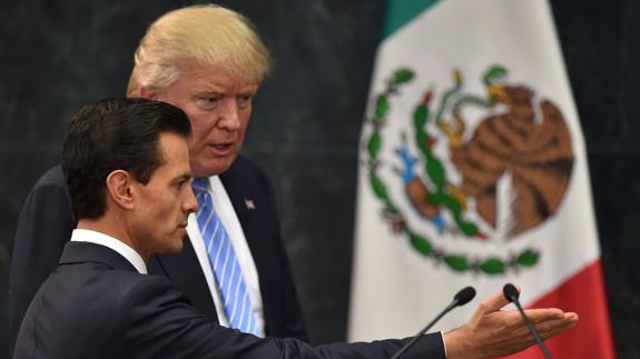 Trump defiende ante Peña Nieto que EE UU tiene derecho a construir un muro fronterizo