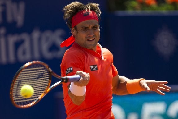 Ferrer vence y Nadal sufre un batacazo en el Godó