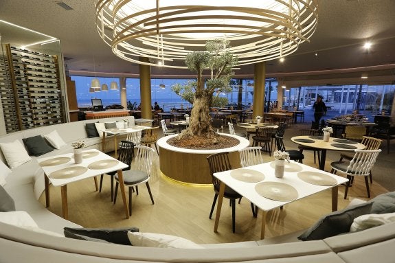 El tripartito en Valencia negocia rebajar el IBI a los hosteleros afectados por la subida