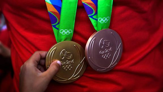 La medalla de sus vidas